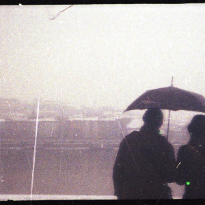 Two Strangers Under 1 umbrella